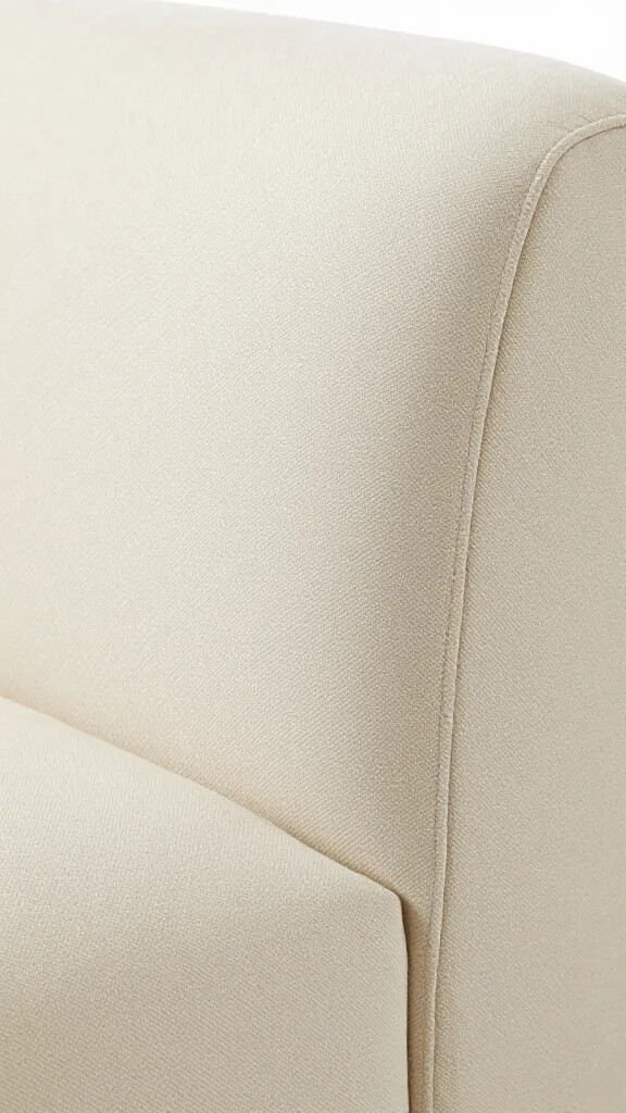 Closeup of cream off-white living room chair texture