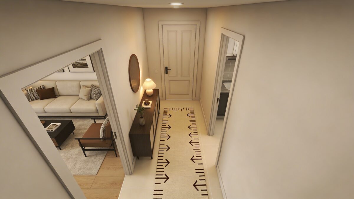 A top-down perspective of a small living room showing a clear straight pathway from door to seating, a narrow console by the entry, and a rug guiding movement, with all furniture arranged for easy navigation.