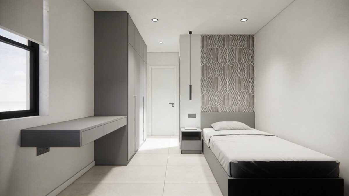 A compact Bloxburg bedroom interior featuring a gray and white palette, a wall-mounted desk with a slim profile, minimal decor, a small bedside table, and a statement wallpapered or textured accent wall behind the bed; floor space appears open and uncluttered.