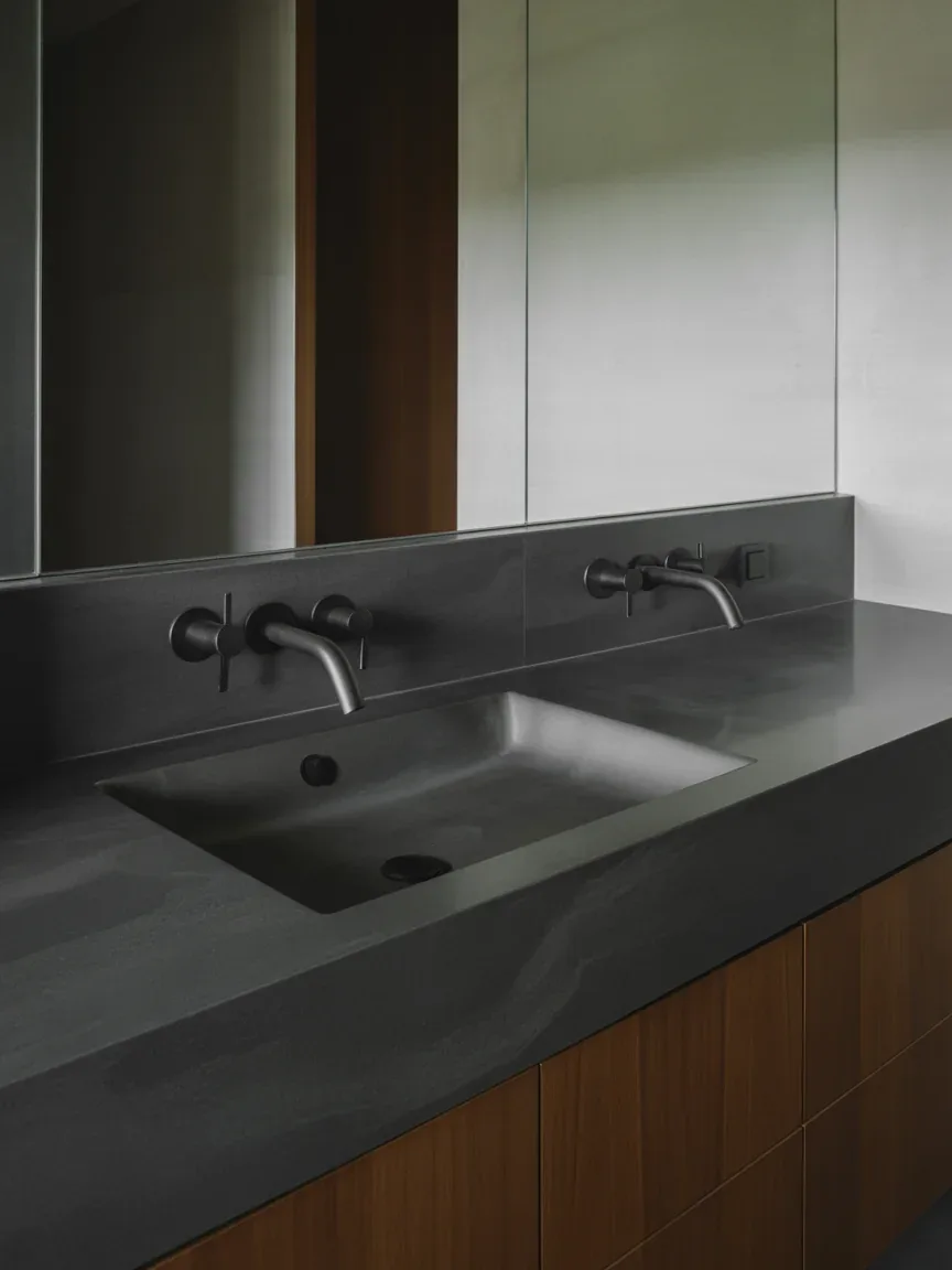 14. Luxe Modern Bathroom With Waterfall Stone Vanity 14. Luxe Modern Bathroom With Waterfall Stone Vanity