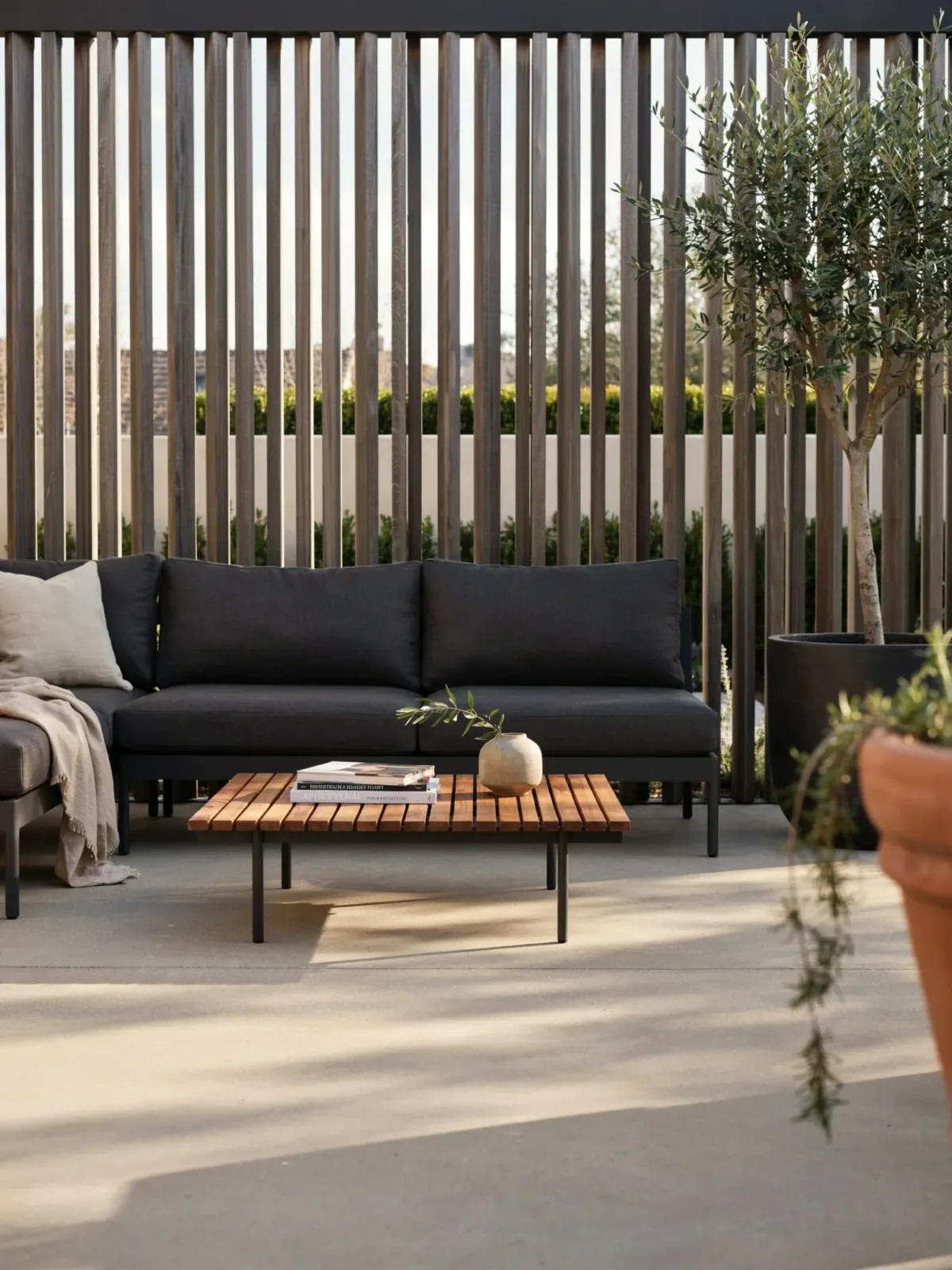 2. Modern Black-And-Wood Entertainment Patio 2. Modern Black-And-Wood Entertainment Patio